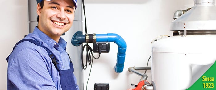 water heater repairman smiling