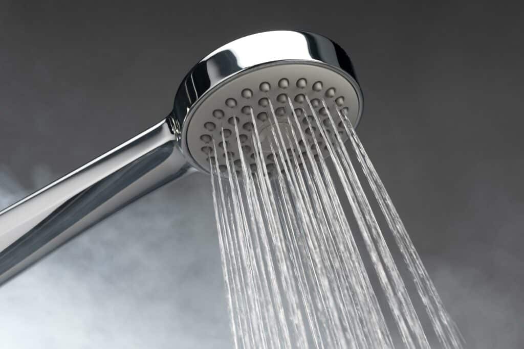 Shower head with endless hot water provided by convenient tankless water heater